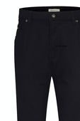 Navy pants with a brand label on a white background